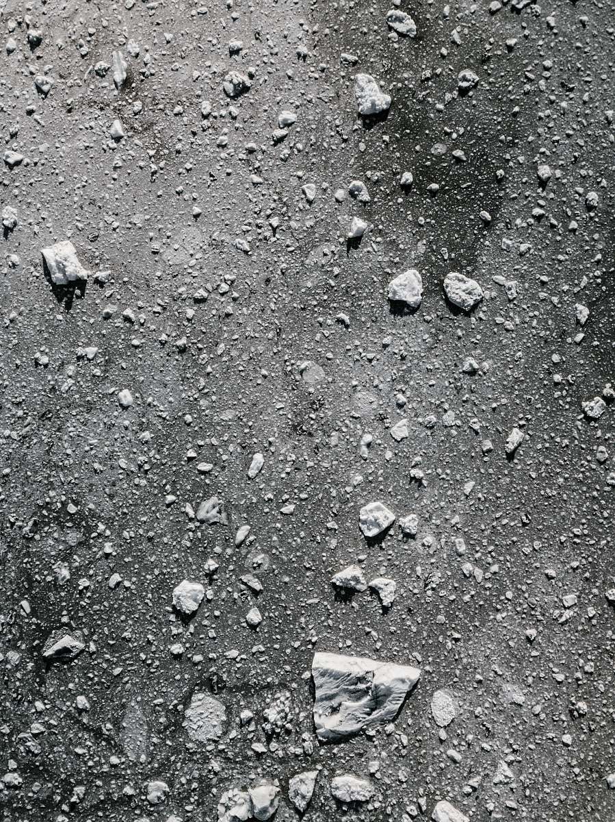 road white and black concrete surface ground