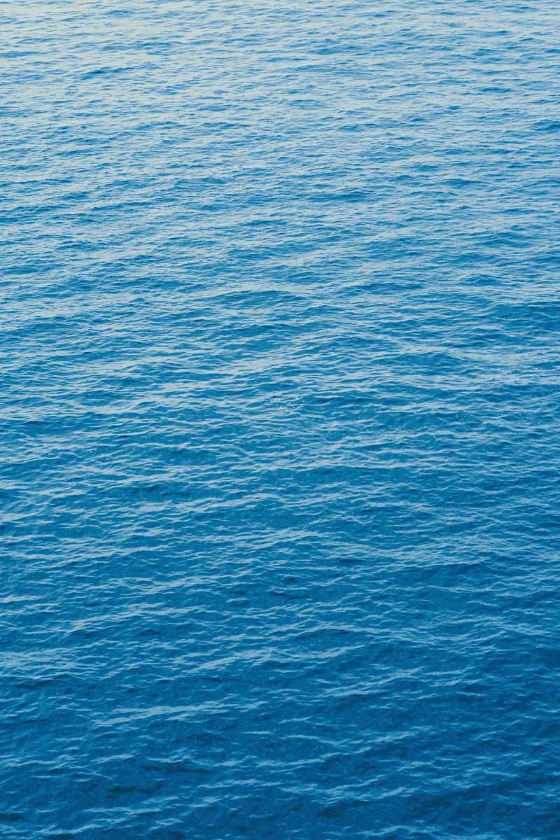 water close up photography of moving water ripple