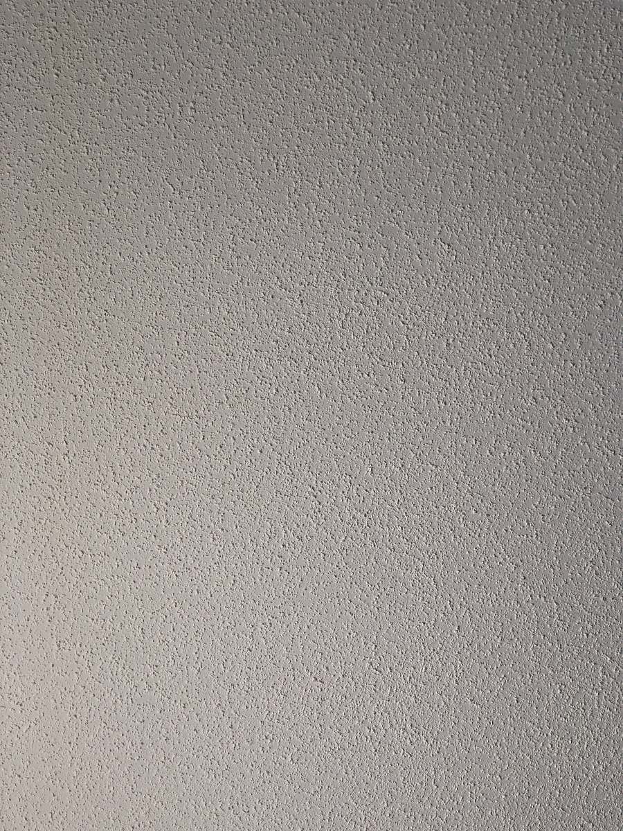 texture white painted wall rug