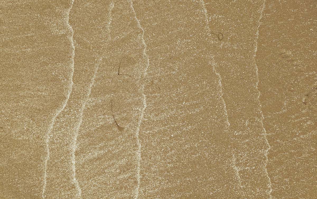 outdoors wavy sea on sand sand