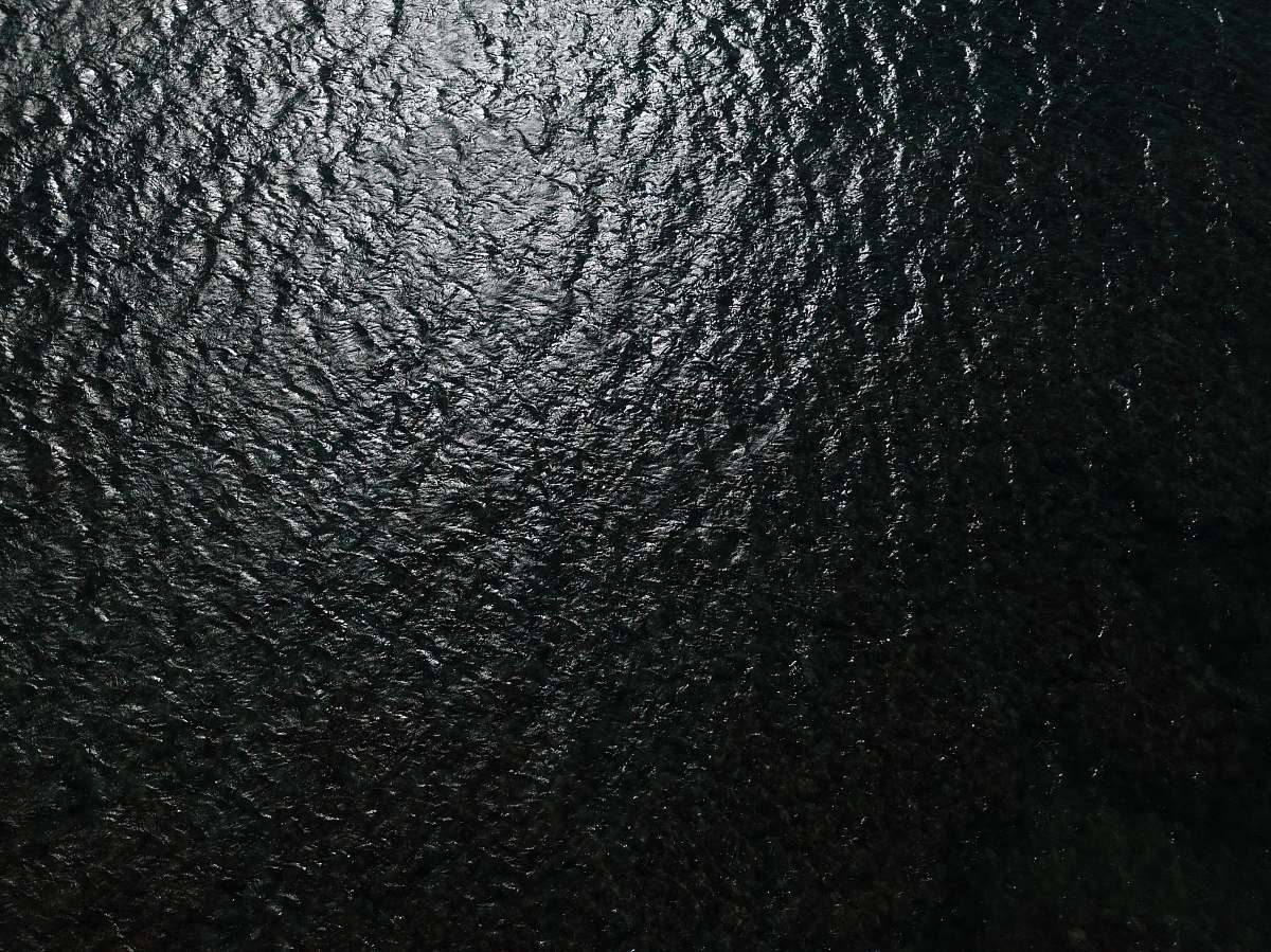 grey black leather textile in close up photography rug