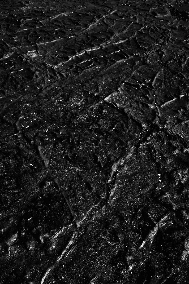 black-and-white black sand ground