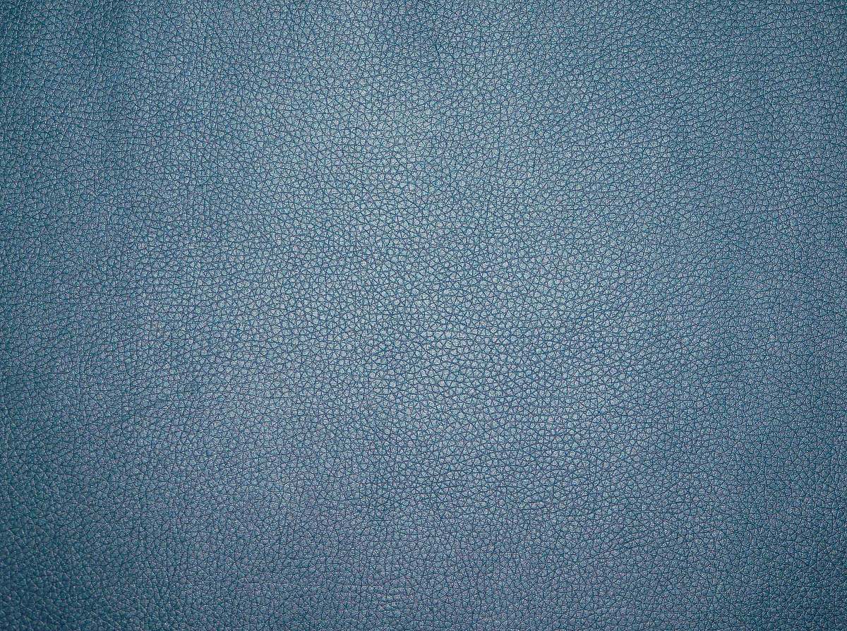 grey blue textile with black background rug