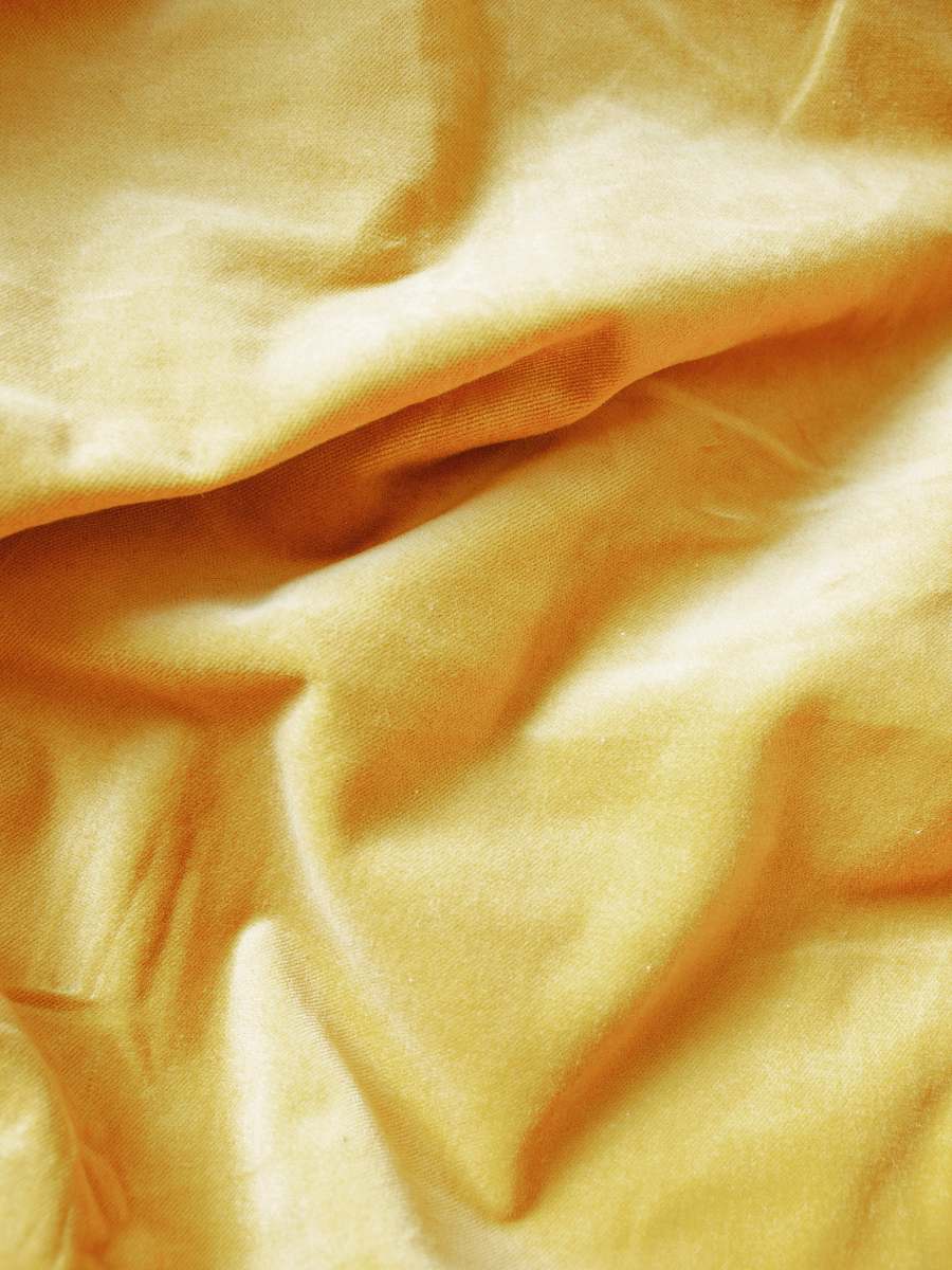 yellow orange cloth blanket
