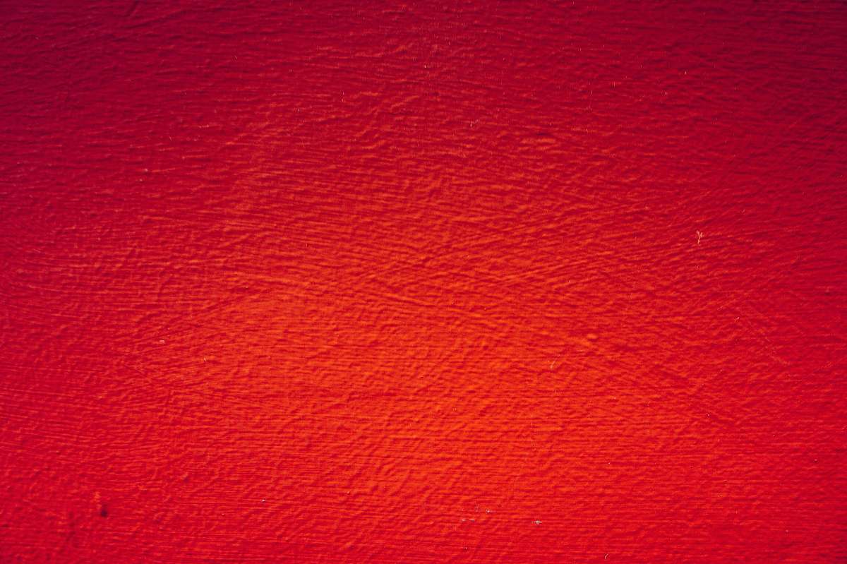 rug red painted wall in close up photography red