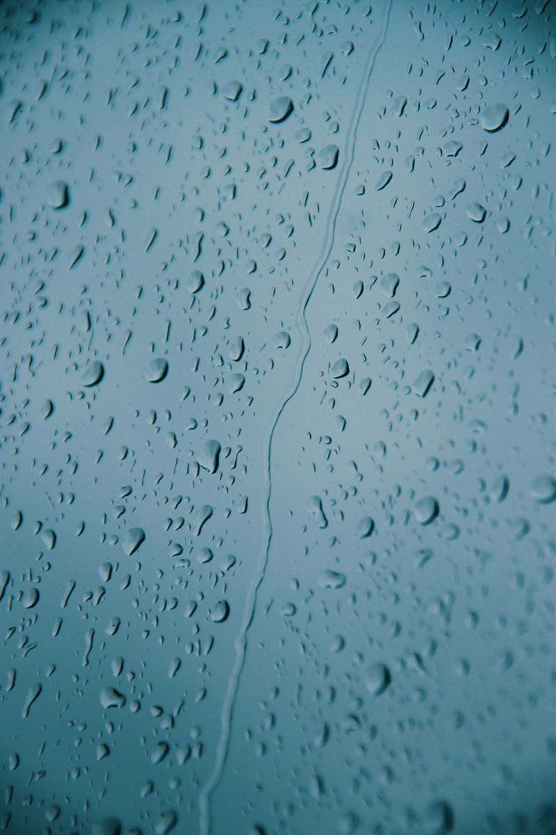 droplet water drops on glass panel grey