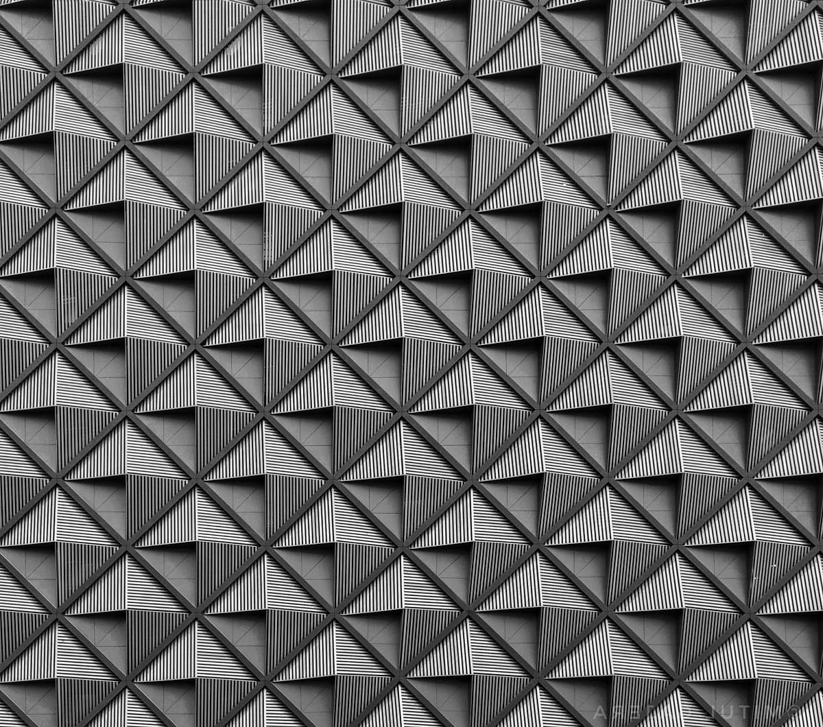 black-and-white white and black concrete building triangle