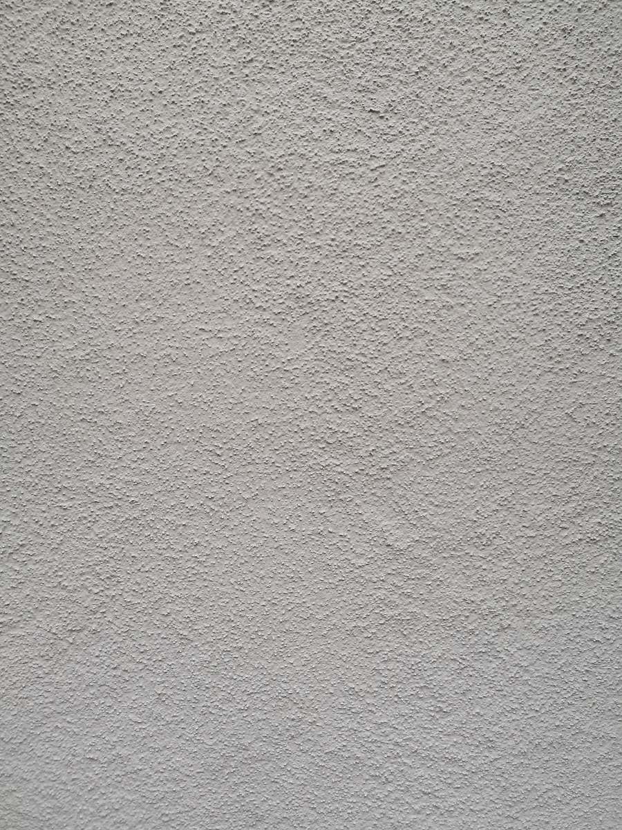 grey white wall paint with black textile concrete