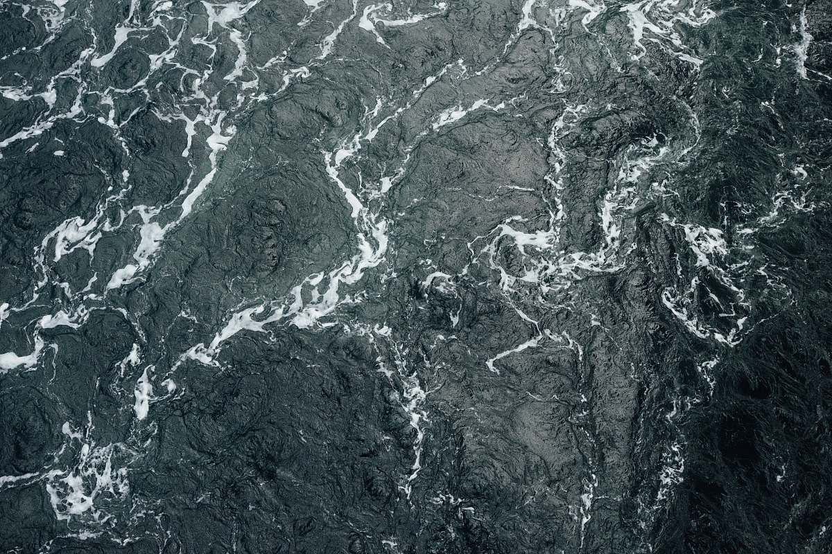 texture A drone shot of the choppy surface of the sea grey