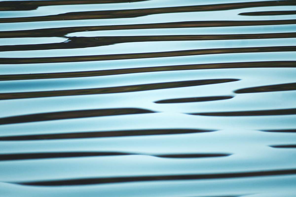 texture An abstract wave ripple background made from water in Vermont blue