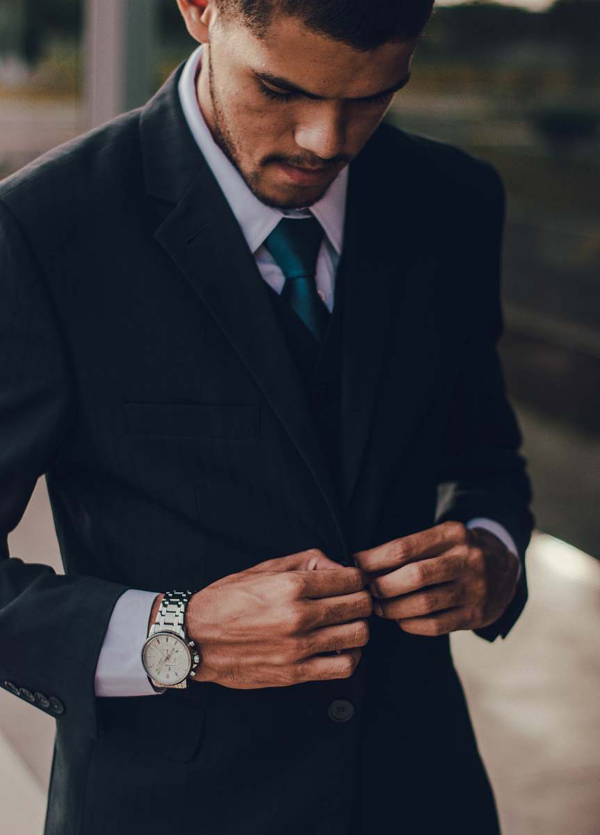 accessory man wearing notched lapel suit jacket tie