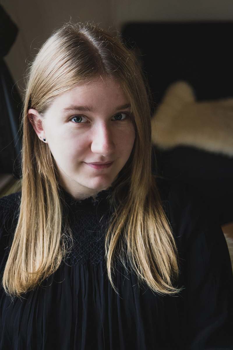 clothing woman wearing black shirt person