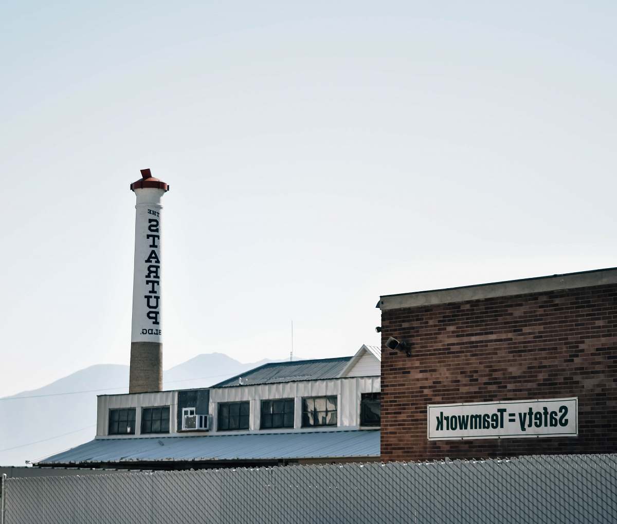 beacon birds eye view of factory grey