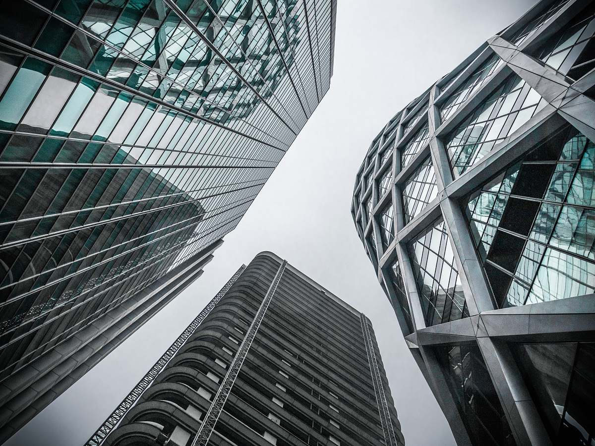 building low angle photography of highrise buildings office building
