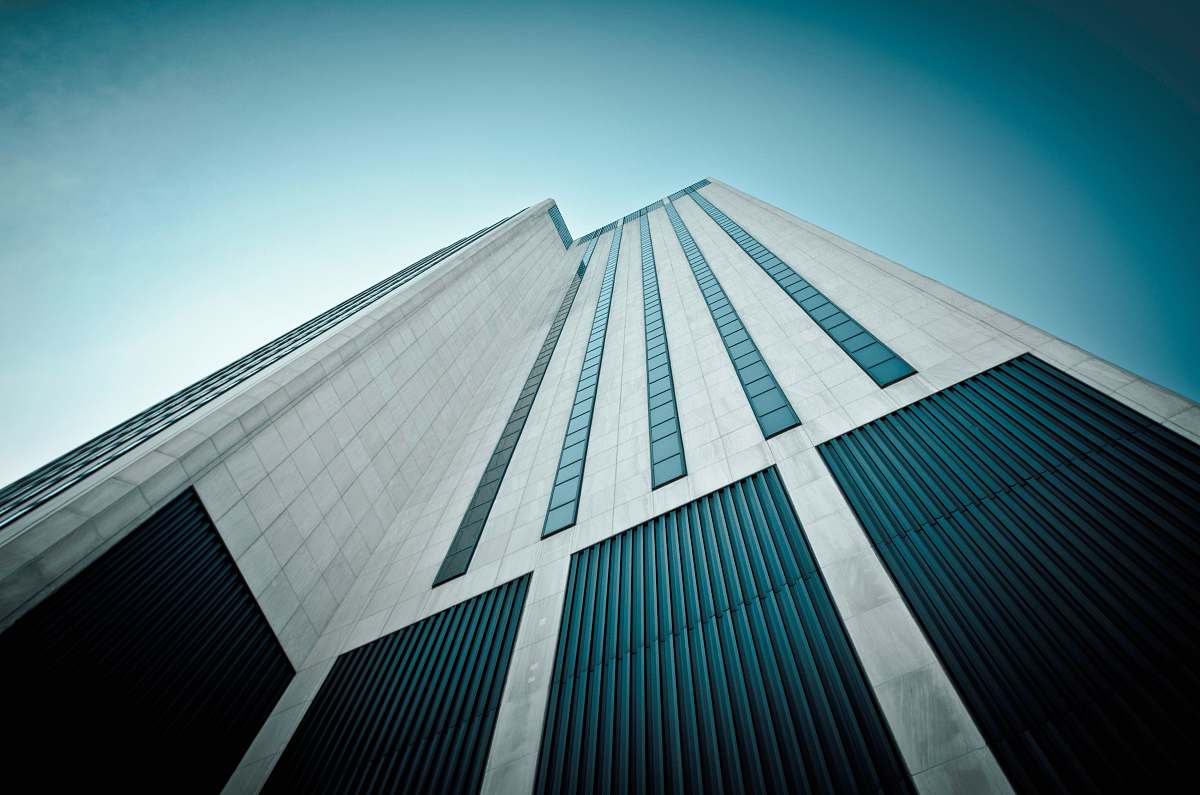 building worm's eyeview of white and black concrete building skyscraper