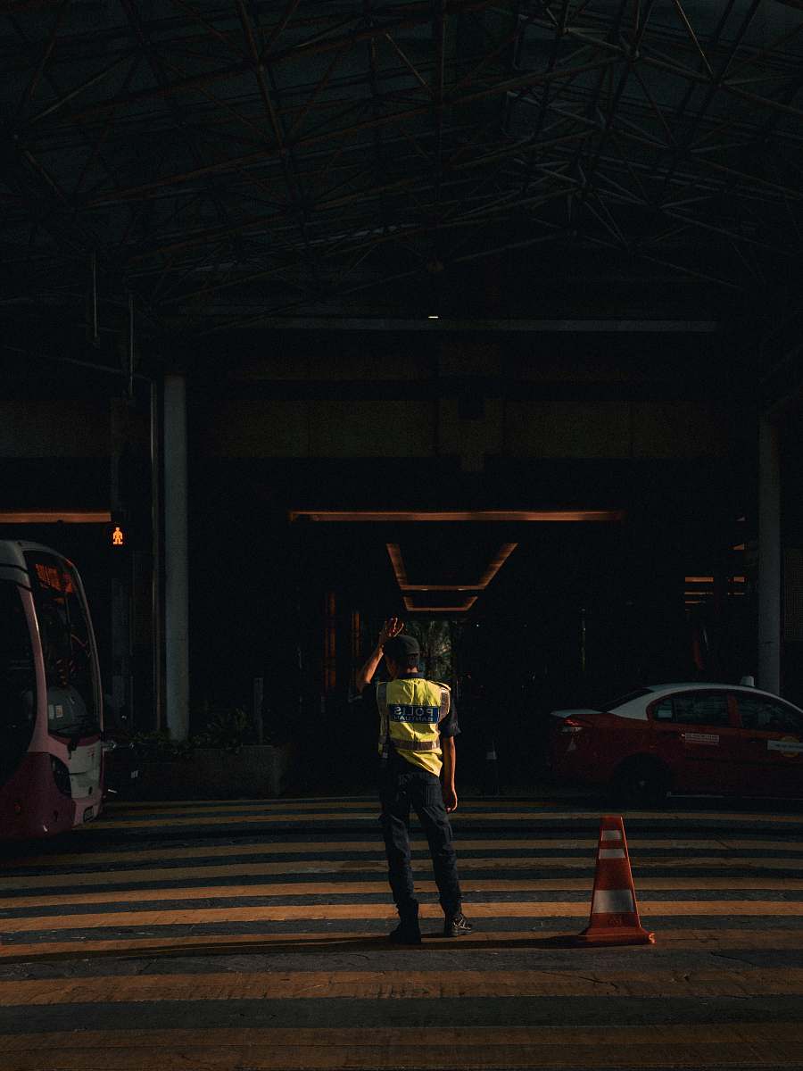 tarmac man standing on road road