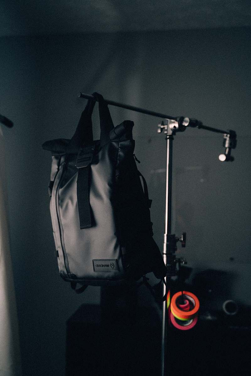 backpack black backpack on rack grey