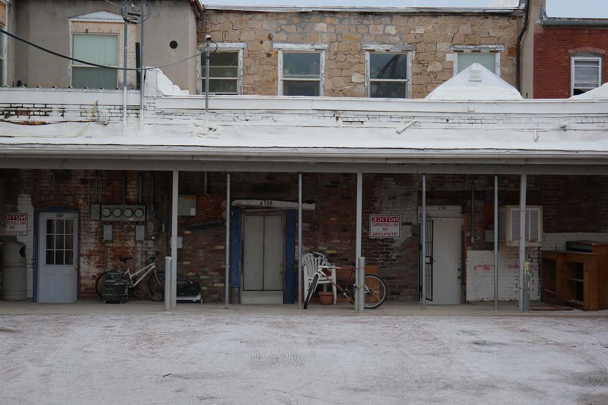 bike brown bricked building transportation