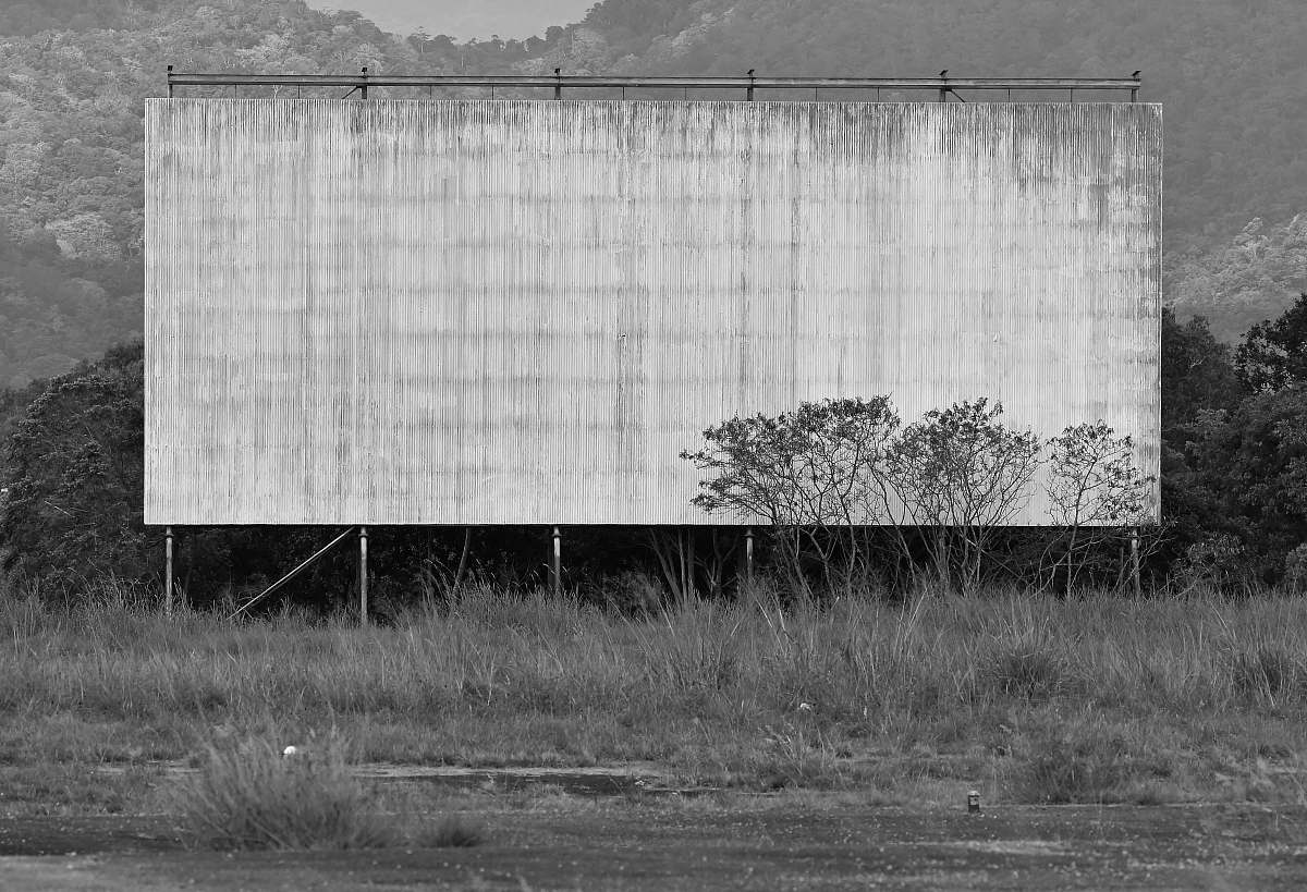 grey grayscale photography of billboard woree