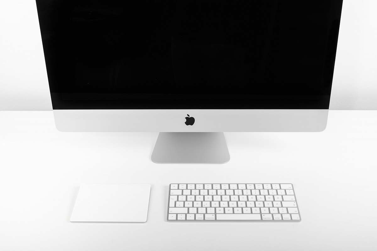 minimal iMac turned off on white desk imac