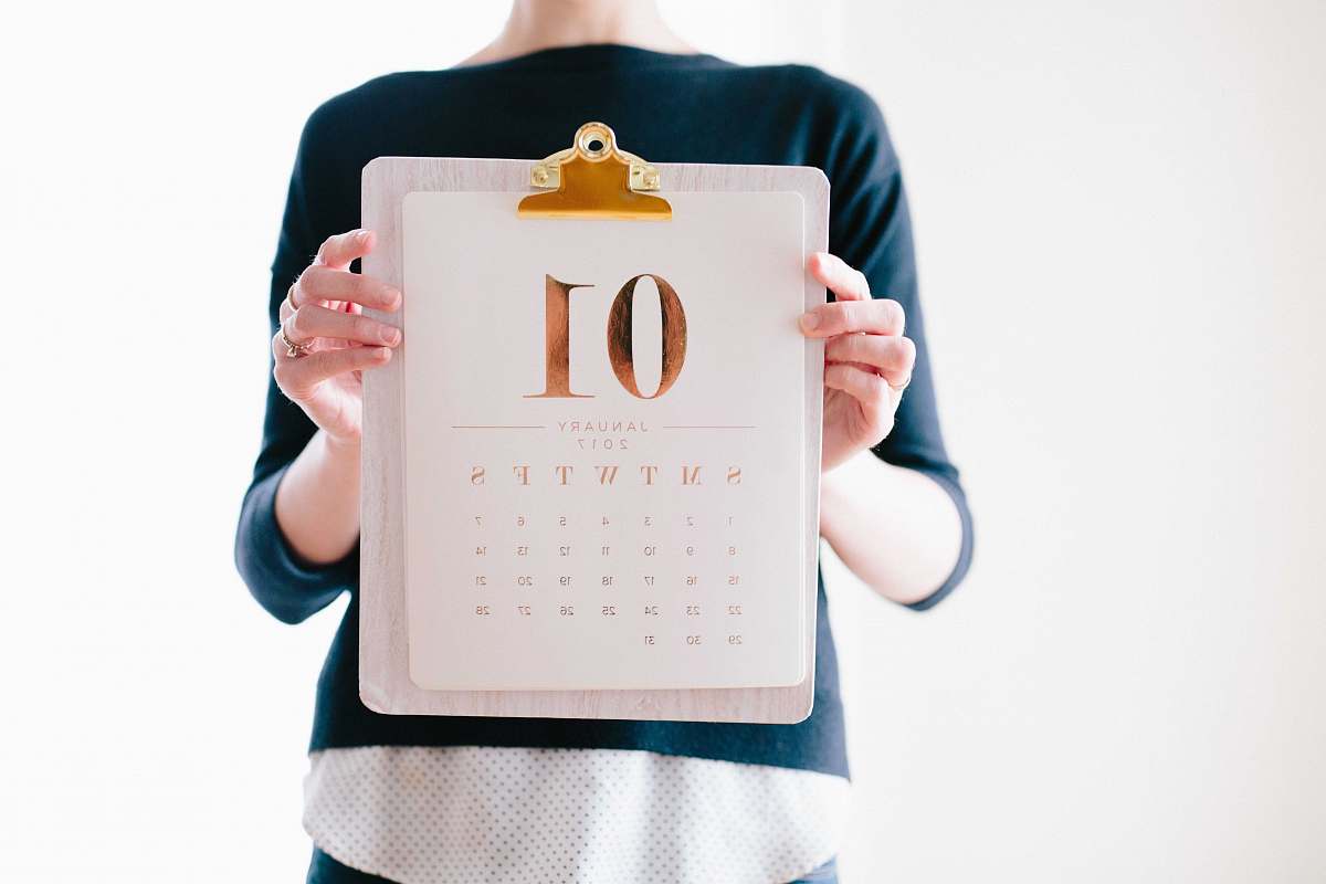 calendar person holding calendar at January woman