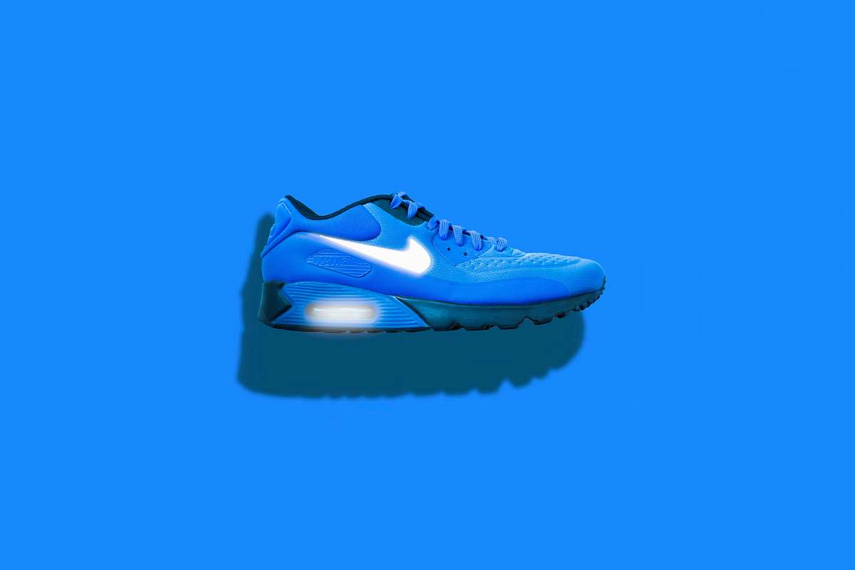 shoe blue, white, and black Nike running shoes clothing