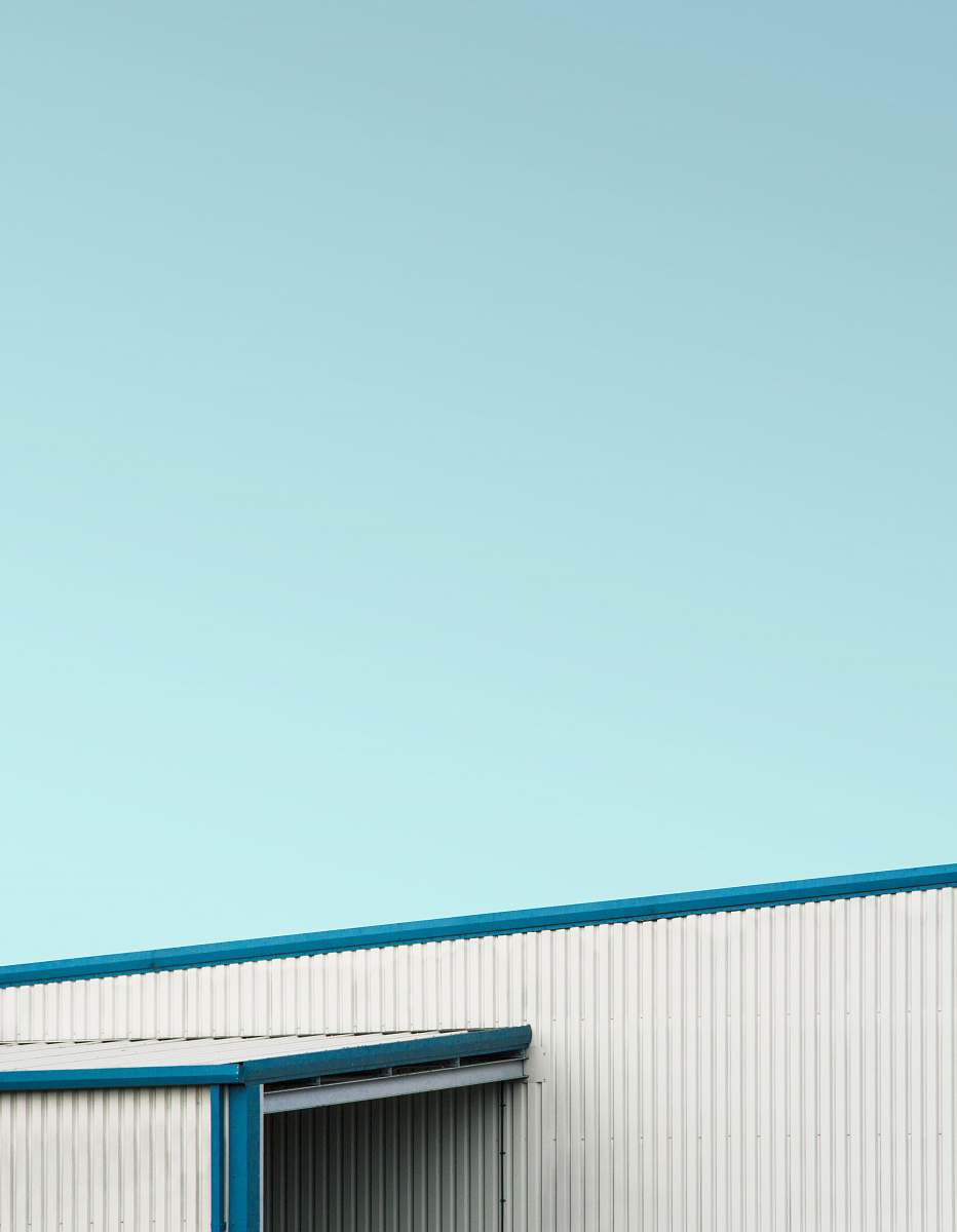 slough closeup photo of white and blue metal fence united kingdom