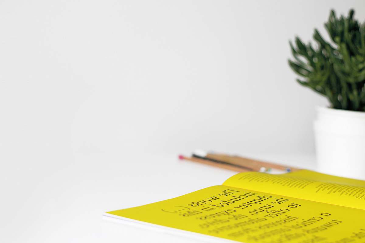 text yellow printer paper on table paper