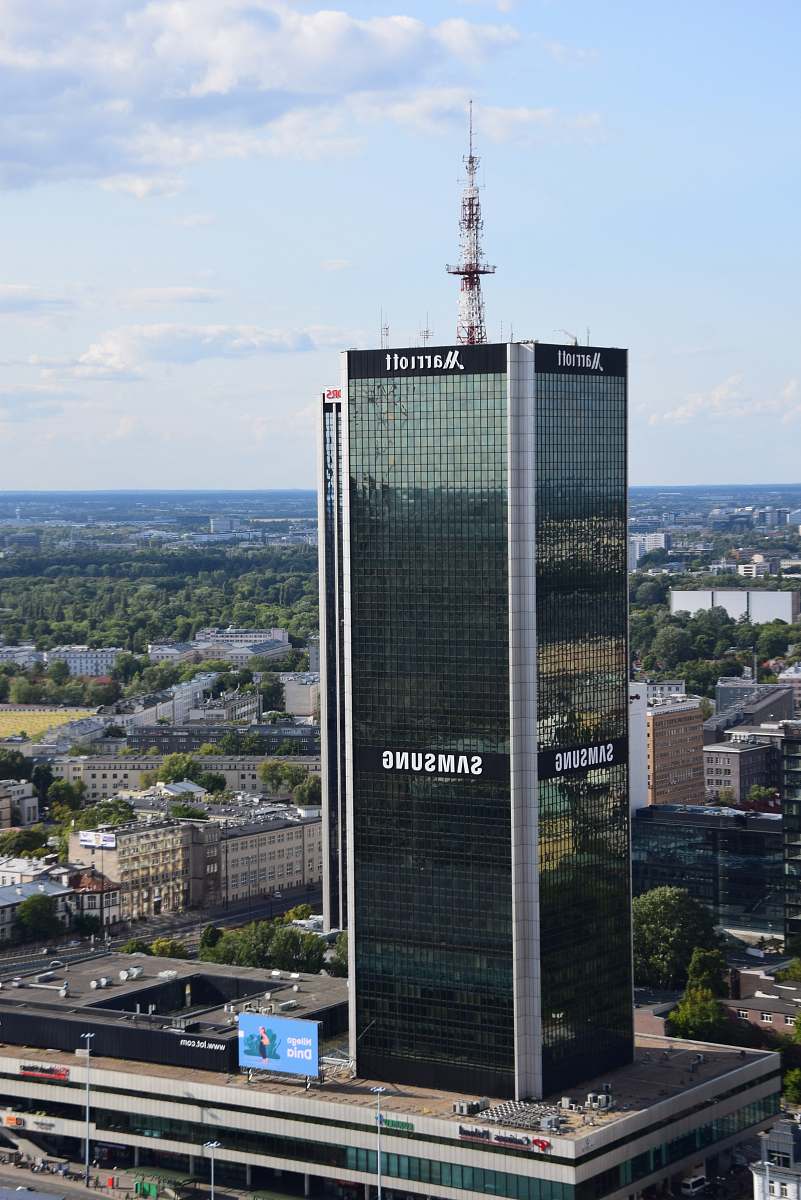 city aerial photography building under clear blue sky high rise