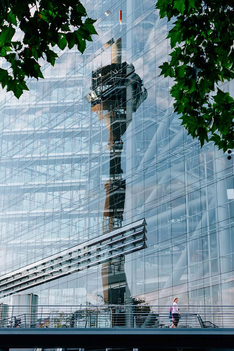 person black and white tower at daytime office building