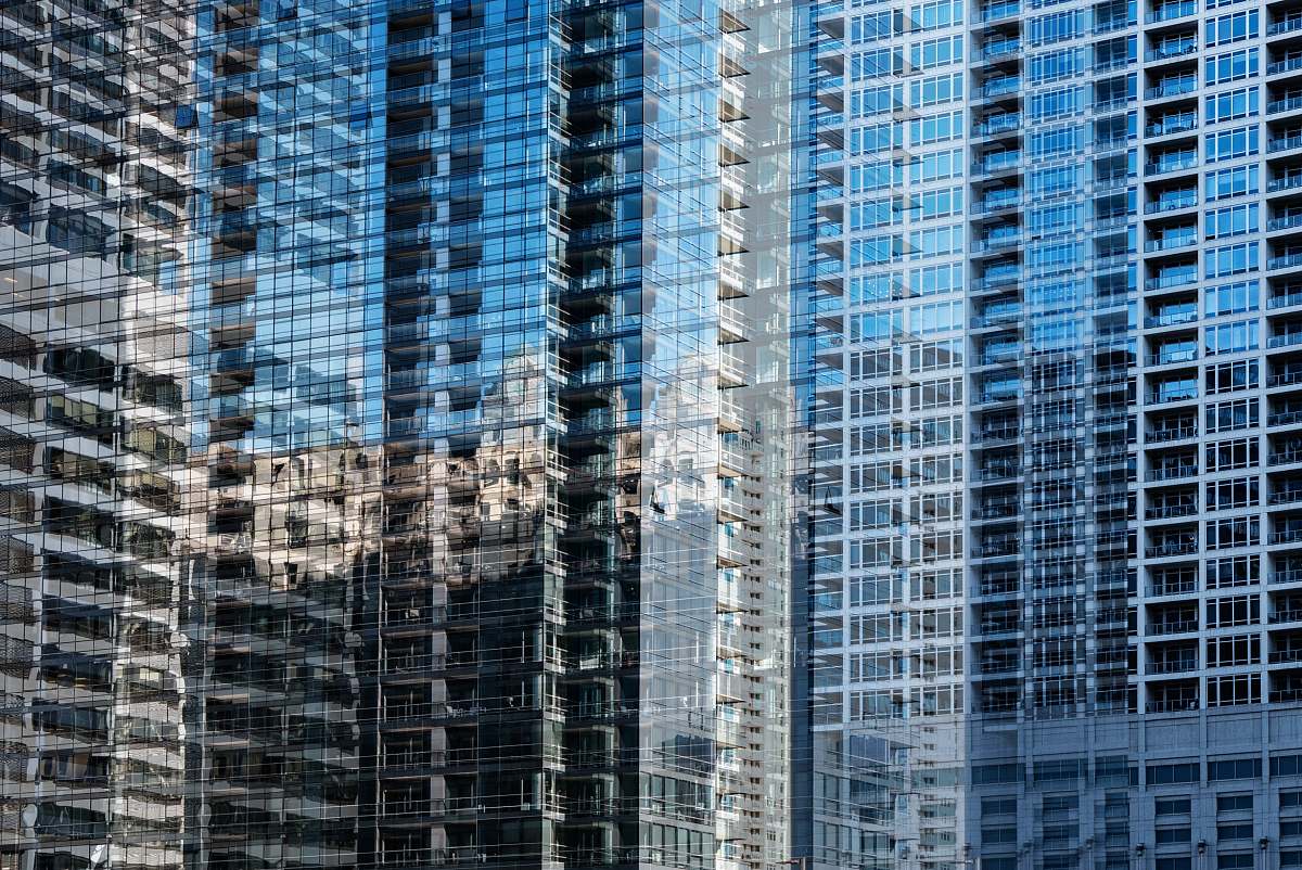 condo blue glass high-rise buildings view housing