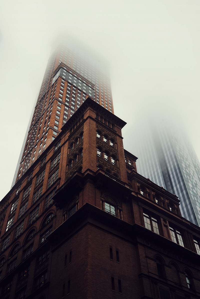 city brown building half-covered with fog new york