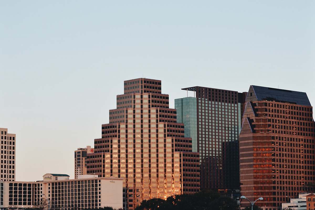 city brown high-rise buildings during daytime office building