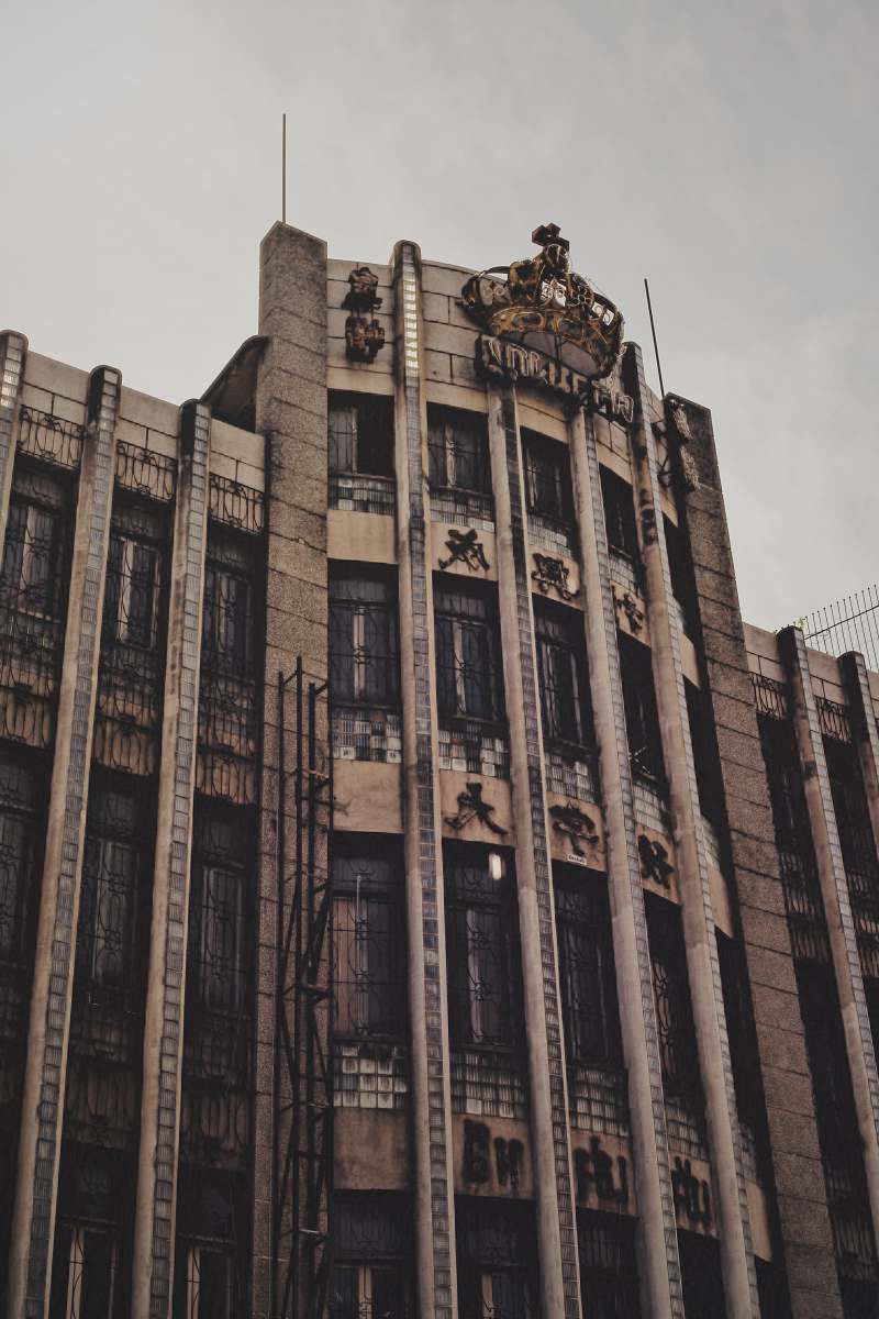 city brown high-rise concrete building high rise