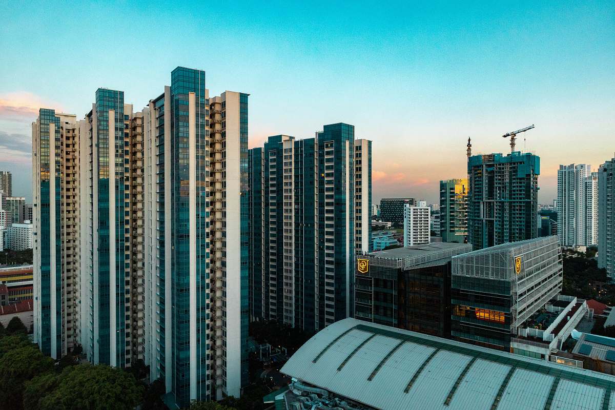singapore buildings beside green trees housing