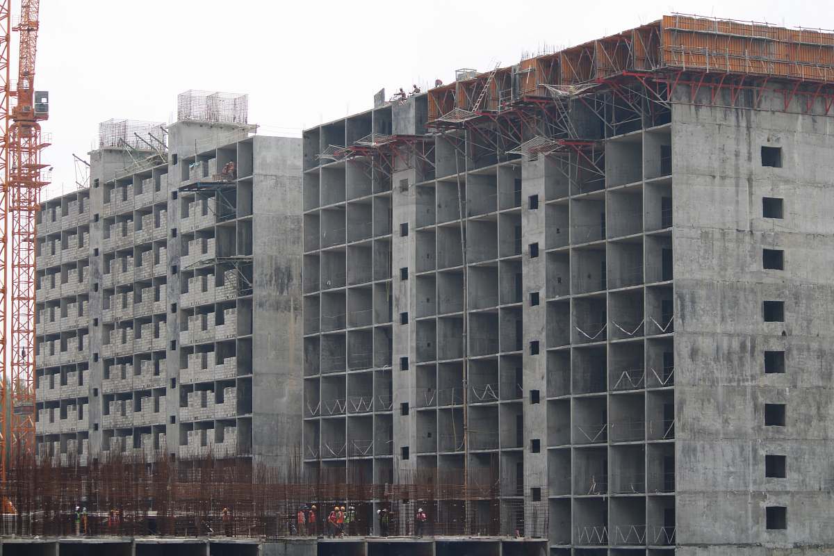 city concrete buildings during daytime high rise