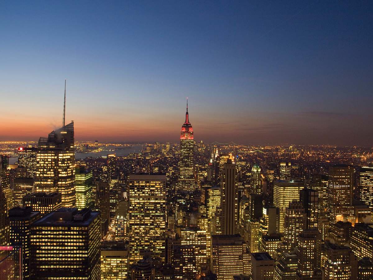 city Empire State building surrounded by buildings town