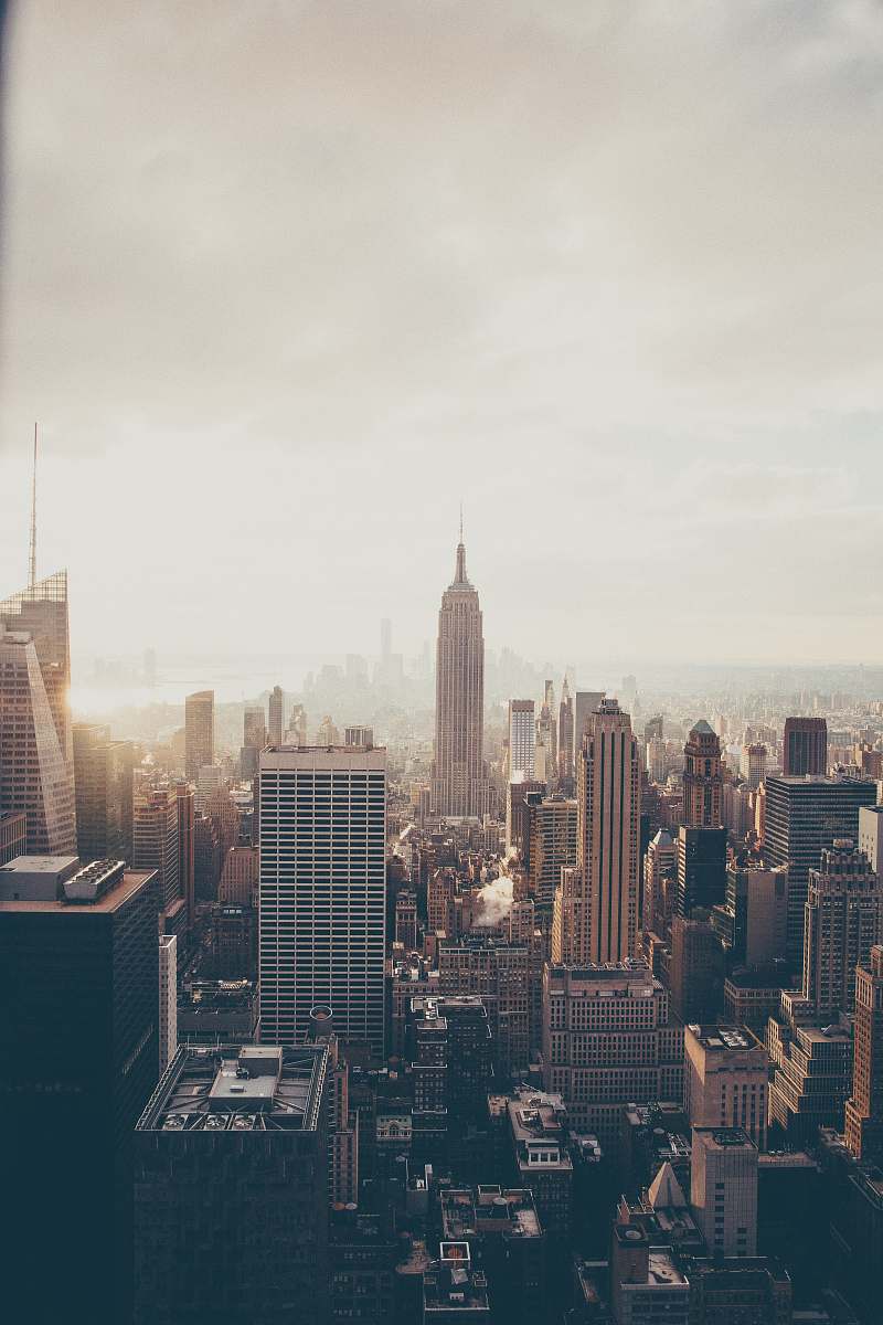 city Empire State Building under white sky high rise
