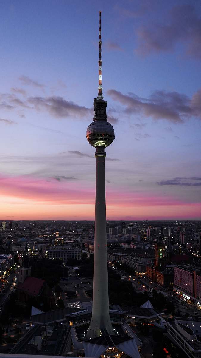 city Fernsehturm Berlin in Berlin Germany during night time metropolis