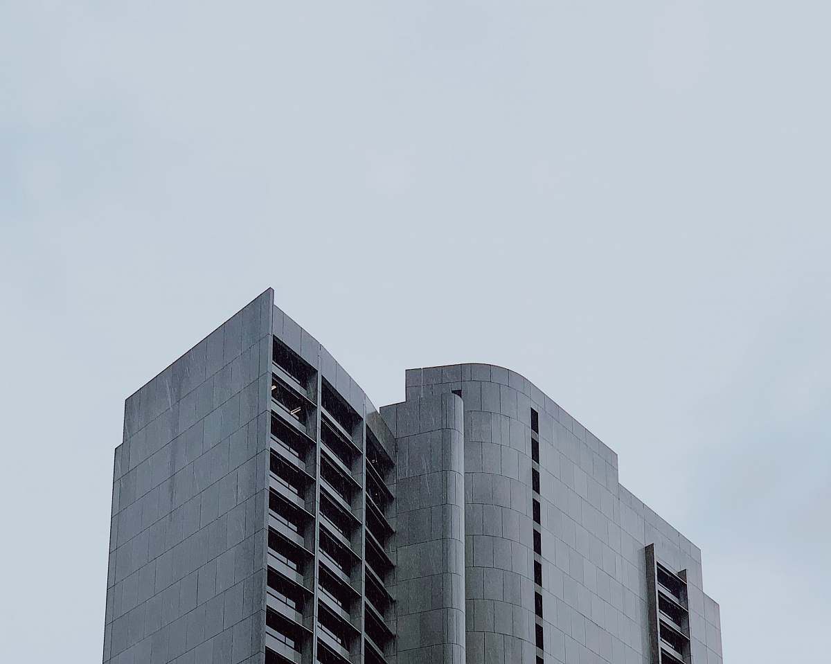 city gray building during day office building