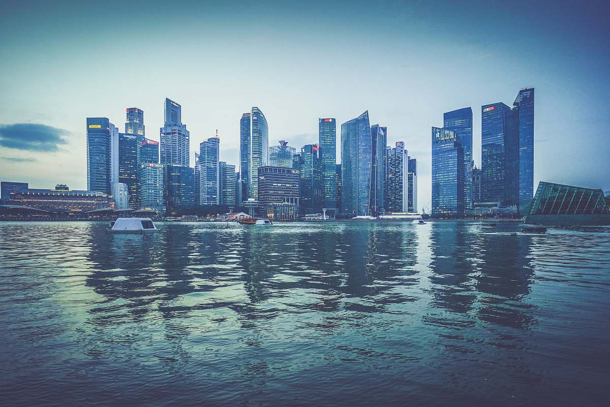 city gray buildings near body of water at daytime singapore