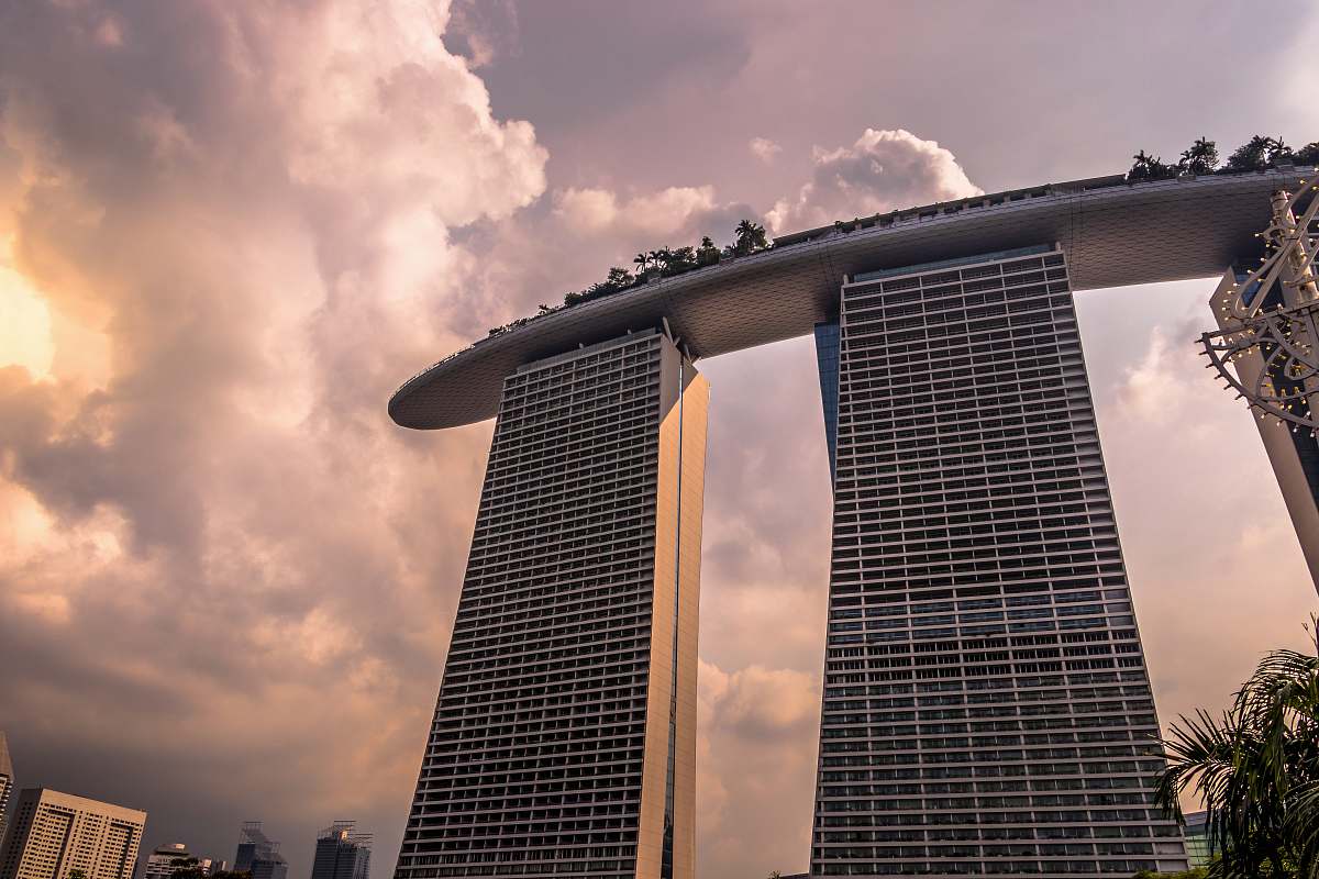 city gray concrete building under white sky during daytime office building