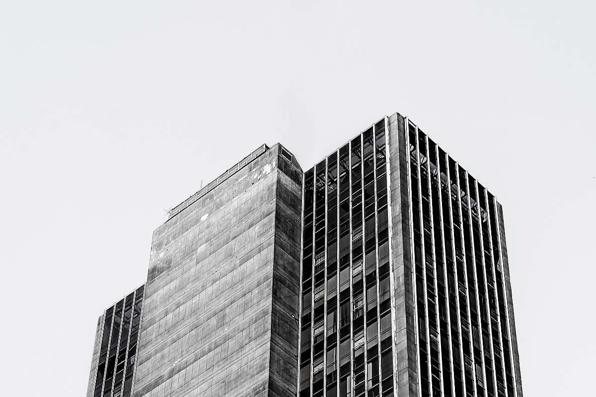 city grayscale photo of building black-and-white