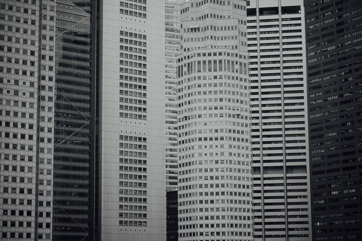 city grayscale photo of buildings black-and-white
