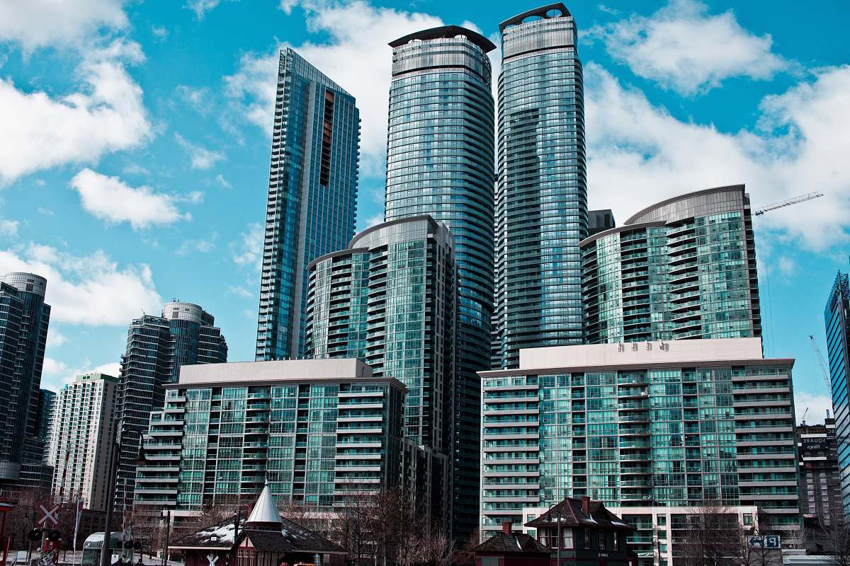 city green and gray building during daytime town