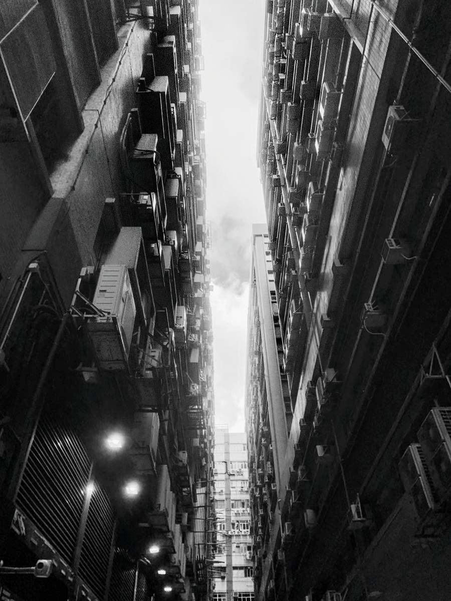 city greyscale photo of building black-and-white