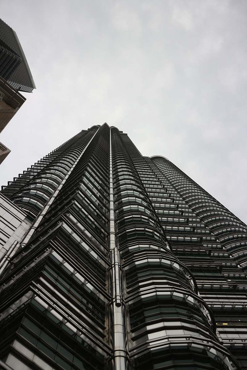 city greyscale photo of high-rise building office building