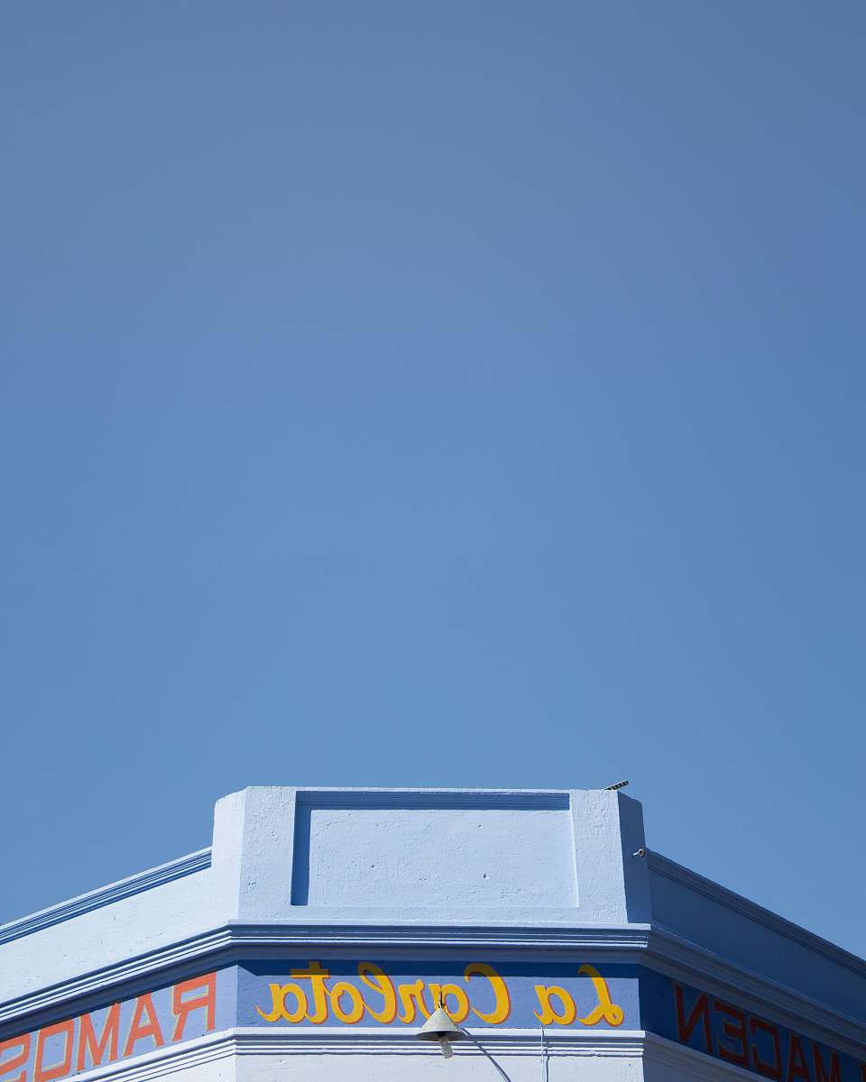 blue La Carlota building under blue sky during daytime colonia del sacramento