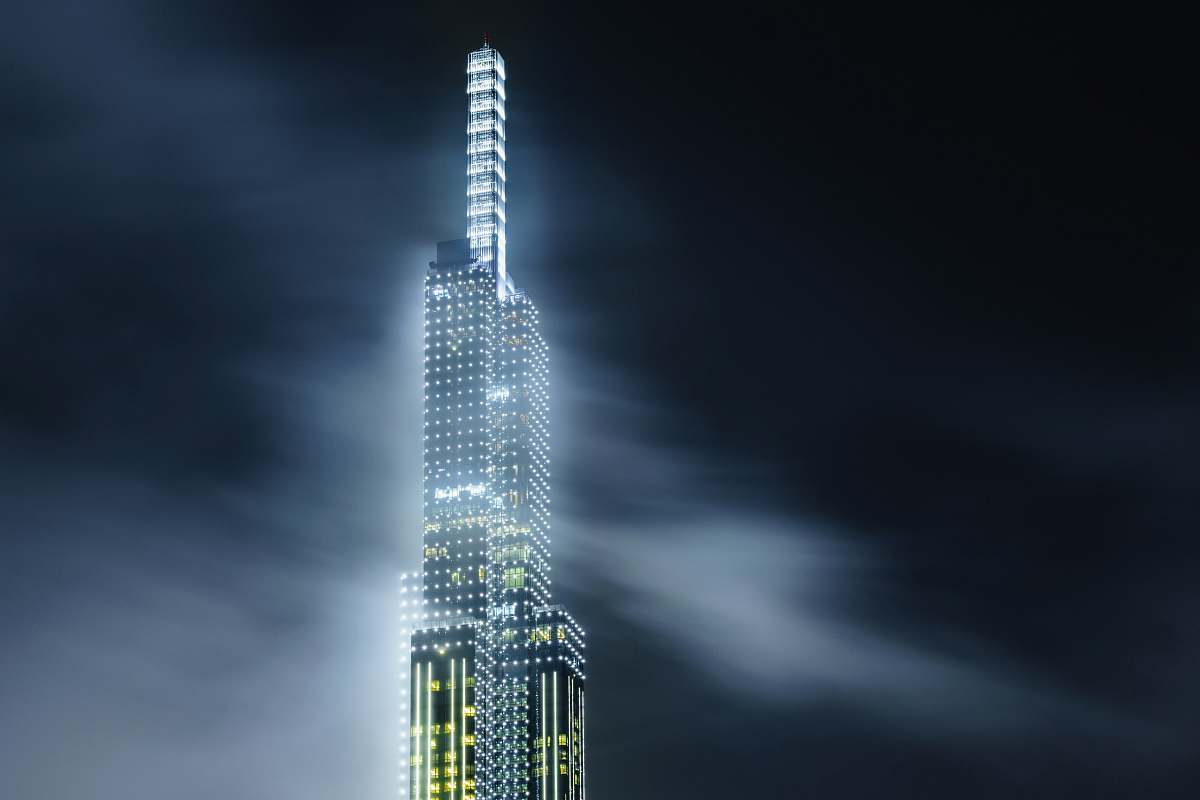 city lighted city building high rise