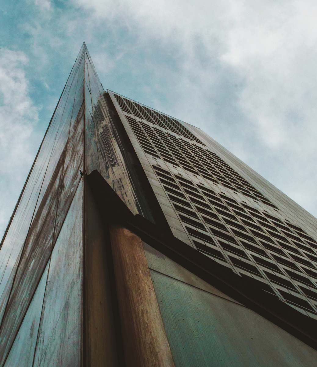 singapore low-angle photo of high-rise building during daytime sky